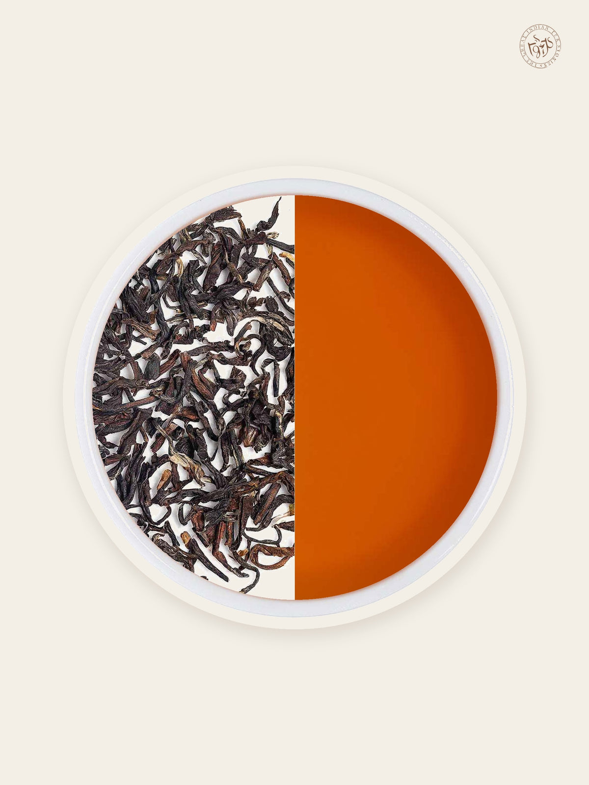 Darjeeling Second Flush loose tea leaves with warm amber tea liquor
